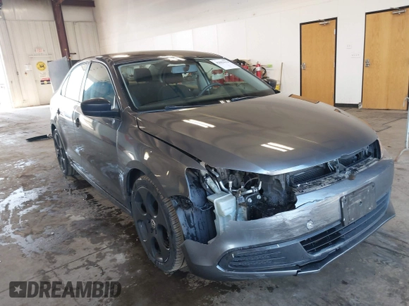 2014 Volkswagen Jetta Sedan S with VIN 3VW2K7AJ5EM410491, listed as a IAAI auction lot 42083614 with 65,960 mi miles. Bid and sale history available at carsss.com. Image 1.