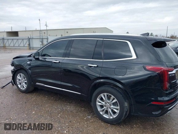 2023 Cadillac XT6 FWD Luxury with VIN 1GYKPAR44PZ114020, listed as a IAAI auction lot 41669115 with 110,305 mi miles and . Bid and sale history available at DreamBid. Image 15.