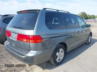 2001 Honda Odyssey EX z VIN 2HKRL18601H532141, wystawiony jako IAAI lot #41981052 z przebiegiem 126 931 mil mil oraz . Historia ofert i sprzedaży dostępna na DreamBid. Obrazek 15.