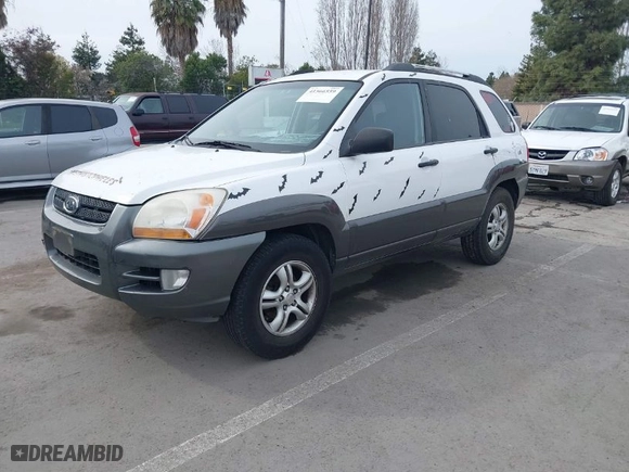 2006 Kia Sportage LX with VIN KNDJF723667293440, listed as a IAAI auction lot 41566559 with 171,681 mi miles. Bid and sale history available at carsss.com. Image 2.