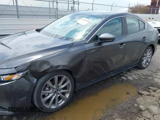2021 Mazda 3 Preferred with VIN 3MZBPACL4MM214814, listed as a IAAI auction lot 42115140 with 28,860 mi miles and . Bid and sale history available at DreamBid. Image 6.