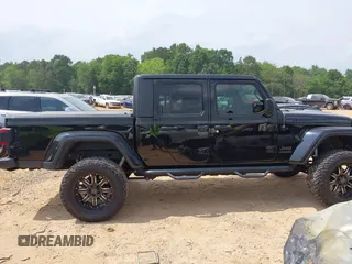 2021 Jeep Gladiator Willys with VIN 1C6HJTAG7ML514114, listed as a IAAI auction lot 42399793 with 78,829 mi miles and . Bid and sale history available at DreamBid. Image 13.