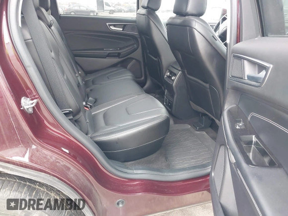 2020 Ford Edge Titanium z VIN 2FMPK4K91LBB56297, wystawiony jako IAAI lot #41938896 z przebiegiem 79 875 mil mil oraz . Historia ofert i sprzedaży dostępna na DreamBid. Obrazek 8.
