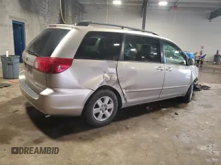2009 Toyota Sienna XLE with VIN 5TDZK22C19S228023, listed as a Copart auction lot 57072295 with 148,080 mi miles and Salvage title. Bid and sale history available at DreamBid. Image 3.