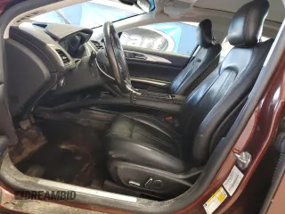 2015 Lincoln MKZ z VIN 3LN6L2J96FR600052, wystawiony jako Copart lot #56194715 z przebiegiem 259 911 mil mil oraz Szkoda całkowita • Salvage title. Historia ofert i sprzedaży dostępna na DreamBid. Obrazek 7.