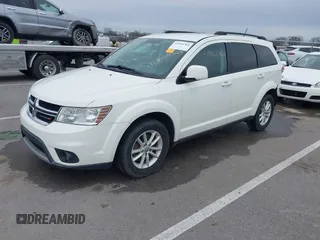 2013 Dodge Journey SXT with VIN 3C4PDCBG9DT564303, listed as a IAAI auction lot 41954764 with 132,125 mi miles. Bid and sale history available at carsss.com. Image 18.
