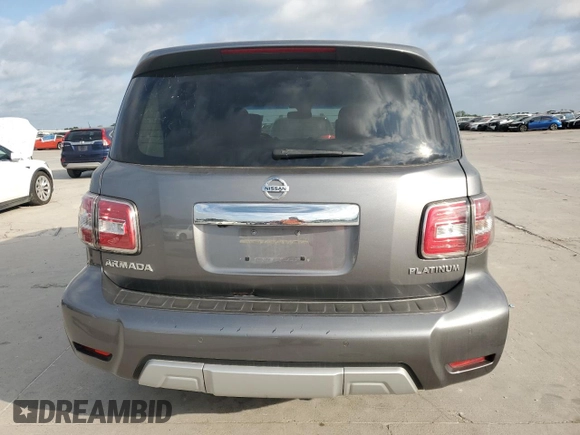2017 Nissan Armada Platinum z VIN JN8AY2NE2H9700319, wystawiony jako Copart lot #51859735 z przebiegiem Nie podano mil oraz Szkoda całkowita • Salvage title. Historia ofert i sprzedaży dostępna na DreamBid. Obrazek 6.