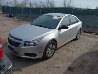 2013 Chevrolet Cruze LS with VIN 1G1PA5SH5D7210935, listed as a IAAI auction lot 42016297 with 90,401 mi miles. Bid and sale history available at carsss.com. Image 2.