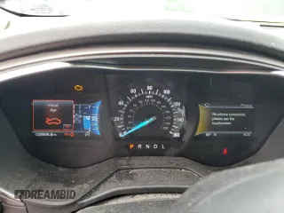 2020 Ford Fusion SE z VIN 3FA6P0HD0LR256243, wystawiony jako Copart lot #56513215 z przebiegiem 59 996 mil mil oraz Szkoda całkowita • Salvage title. Historia ofert i sprzedaży dostępna na DreamBid. Obrazek 9.