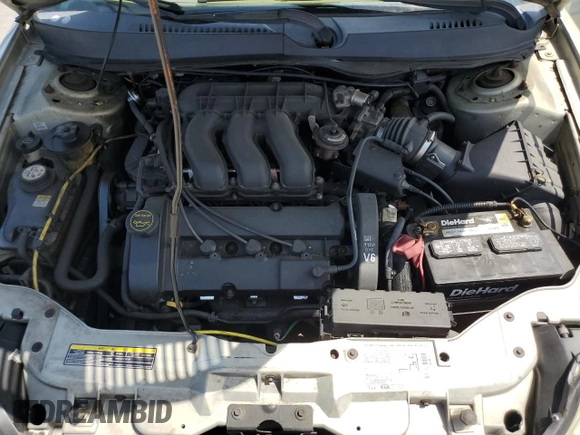 2003 Mercury Sable LS Premium с VIN 1MEFM55S23A617225, выставлен на аукционе Copart как лот 52021765 с пробегом 131 291 миль миль и Списание • Salvage title. История ставок и продаж доступна на DreamBid. Изображение 13.