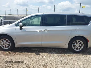 2023 Chrysler Pacifica Touring L with VIN 2C4RC1BG7PR521232, listed as a IAAI auction lot 42087909 with 34,609 mi miles and . Bid and sale history available at DreamBid. Image 13.