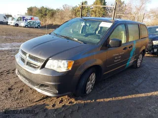 2016 Dodge Grand Caravan Canada Value Package with VIN 2C4RDGBG5GR125994, listed as a IAAI auction lot 41664669 with 236,117 mi miles. Bid and sale history available at carsss.com. Image 2.