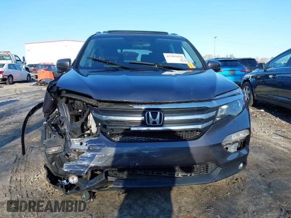 2016 Honda Pilot EX-L z VIN 5FNYF5H54GB041614, wystawiony jako IAAI lot #41505898 z przebiegiem Nie podano mil oraz . Historia ofert i sprzedaży dostępna na DreamBid. Obrazek 11.