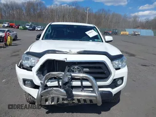 2020 Toyota Tacoma SR5 with VIN 3TMCZ5AN5LM339977, listed as a IAAI auction lot 41886937 with 94,986 mi miles and . Bid and sale history available at DreamBid. Image 12.
