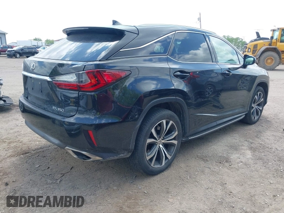 2017 Lexus RX 350 with VIN 2T2BZMCA8HC066061, listed as a IAAI auction lot 42203677 with 165,618 mi miles and . Bid and sale history available at DreamBid. Image 4.