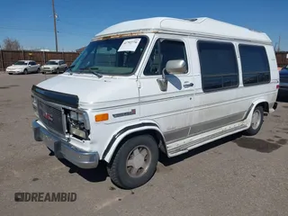 1995 GMC Vandura z VIN 1GDEG25K3SF542874, wystawiony jako IAAI lot #41792770 z przebiegiem 176 778 mil mil oraz . Historia ofert i sprzedaży dostępna na DreamBid. Obrazek 2.