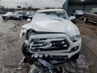 2021 Toyota Tacoma SR z VIN 3TYSZ5AN0MT009231, wystawiony jako Copart lot #49252665 z przebiegiem Nie podano mil oraz Szkoda całkowita • Salvage title. Historia ofert i sprzedaży dostępna na DreamBid. Obrazek 5.