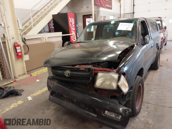 1998 Toyota Tacoma with VIN 4TANL42N4WZ030101, listed as a IAAI auction lot 41735767 with 247,387 mi miles. Bid and sale history available at carsss.com. Image 12.