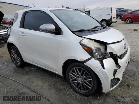 2012 Scion iQ with VIN JTNJJXB0XCJ011508, listed as a Copart auction lot 42368065 with 161,965 mi miles and Salvage title. Bid and sale history available at DreamBid. Image 4.