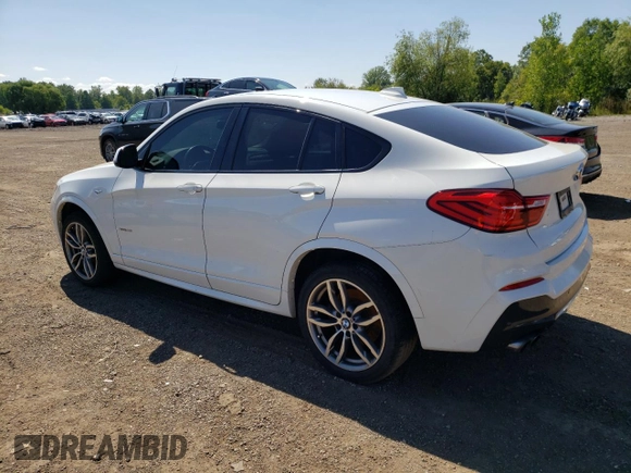 2015 BMW X4 xDrive28i with VIN 5UXXW3C53F0F89089, listed as a Copart auction lot 65869723 with 79,072 mi miles. Bid and sale history available at carsss.com. Image 2.