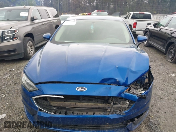 2017 Ford Fusion SE z VIN 3FA6P0H77HR309263, wystawiony jako IAAI lot #41914769 z przebiegiem 136 833 mil mil oraz . Historia ofert i sprzedaży dostępna na DreamBid. Obrazek 11.