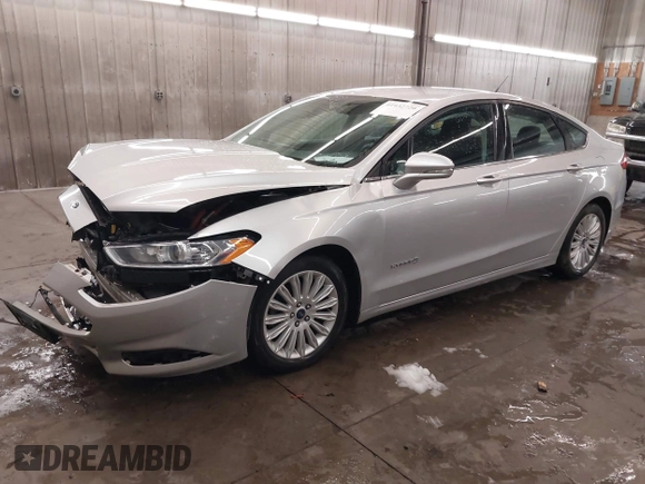 2016 Ford Fusion SE Hybrid z VIN 3FA6P0LU1GR304166, wystawiony jako IAAI lot #41932720 z przebiegiem 68 058 mil mil oraz . Historia ofert i sprzedaży dostępna na DreamBid. Obrazek 18.