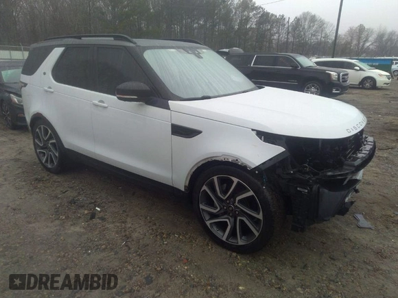 2018 Land Rover Discovery HSE Luxury z VIN SALRT2RV3JA057709, wystawiony jako IAAI lot #41563821 z przebiegiem 99 639 mil mil oraz . Historia ofert i sprzedaży dostępna na DreamBid. Obrazek 1.