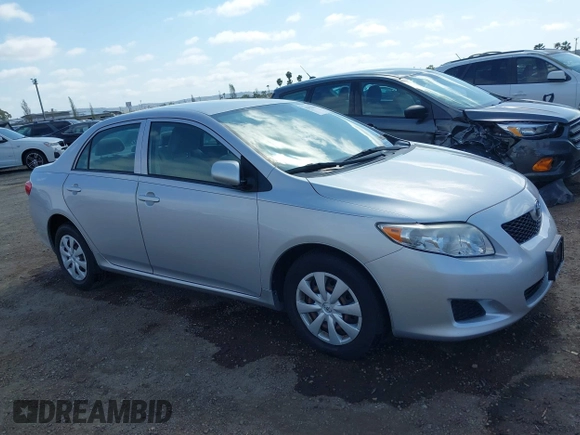 2009 Toyota Corolla with VIN 1NXBU40E49Z060073, listed as a IAAI auction lot 42152619 with 43,540 mi miles. Bid and sale history available at carsss.com. Image 1.