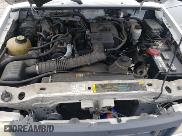 2009 Ford Ranger XL z VIN 1FTYR10D99PA53656, wystawiony jako Copart lot #56965205 z przebiegiem 117 473 mil mil oraz Szkoda całkowita • Salvage title. Historia ofert i sprzedaży dostępna na DreamBid. Obrazek 11.