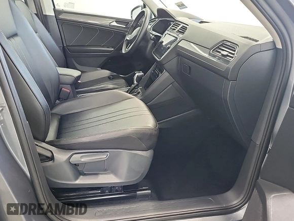 2024 Volkswagen Tiguan SE with VIN 3VV3B7AX1RM108036, listed as a IAAI auction lot 42796415 with 37,805 mi miles and . Bid and sale history available at DreamBid. Image 23.