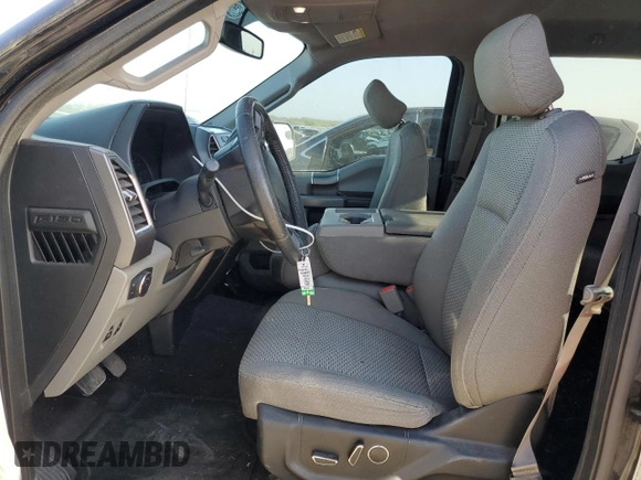 2016 Ford F-150 XLT with VIN 1FTEW1C82GKE31076, listed as a Copart auction lot 49162425 with 143,121 mi miles and Salvage title. Bid and sale history available at DreamBid. Image 7.