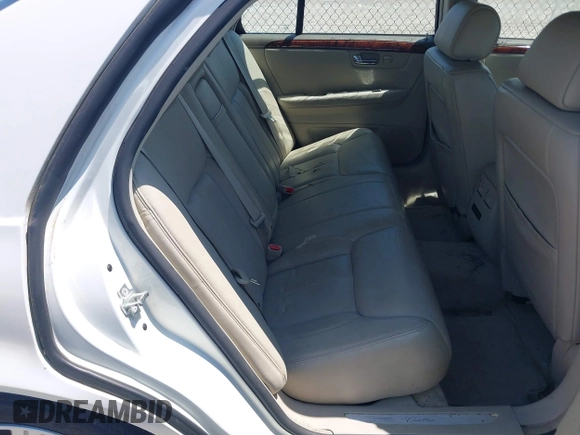 2006 Cadillac DTS 1SD z VIN 1G6KD57Y06U208812, wystawiony jako IAAI lot #42233924 z przebiegiem 120 244 mil mil oraz . Historia ofert i sprzedaży dostępna na DreamBid. Obrazek 8.