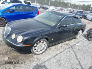 2005 Jaguar S-Type with VIN SAJWA01T15FN16454, listed as a IAAI auction lot 41650066 with 104,942 mi miles and . Bid and sale history available at DreamBid. Image 2.