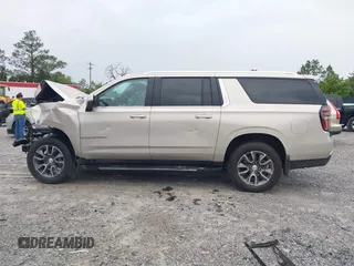 2023 Chevrolet Suburban LT with VIN 1GNSCCKD2PR170276, listed as a IAAI auction lot 42207490 with Not provided miles and . Bid and sale history available at DreamBid. Image 15.