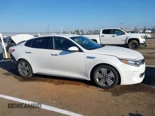 2017 Kia Optima EX with VIN KNAGU4LE8H5017318, listed as a IAAI auction lot 41885802 with 104,797 mi miles and . Bid and sale history available at DreamBid. Image 14.
