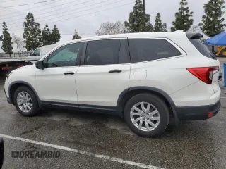 2019 Honda Pilot LX with VIN 5FNYF5H12KB015096, listed as a Copart auction lot 48802345 with 94,445 mi miles and Salvage Title. Bid and sale history available at DreamBid. Image 2.