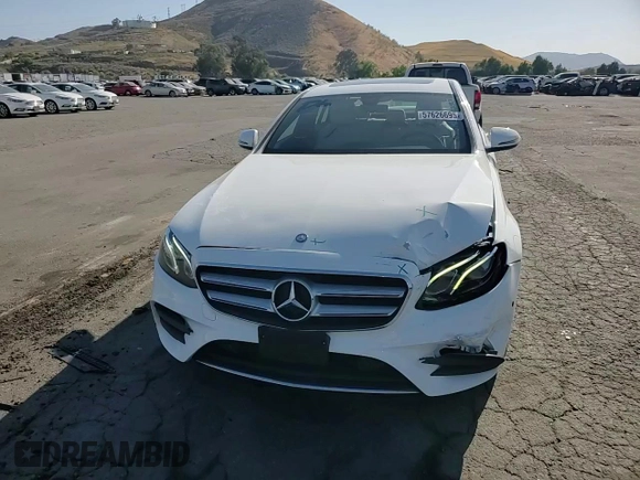 2017 Mercedes-Benz E 300 Luxury z VIN WDDZF4JB9HA139844, wystawiony jako Copart lot #57626695 z przebiegiem 27 377 mil mil oraz Szkoda całkowita • Salvage title. Historia ofert i sprzedaży dostępna na DreamBid. Obrazek 13.