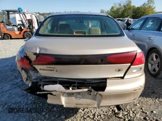 1997 Ford Escort LX with VIN 1FALP13P0VW403591, listed as a Copart auction lot 74321544 with 134,706 mi miles and Salvage Title. Bid and sale history available at carsss.com. Image 6.