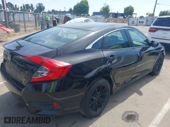 2019 Honda Civic Sedan LX with VIN 2HGFC2F61KH510012, listed as a IAAI auction lot 42073212 with 86,487 mi miles. Bid and sale history available at carsss.com. Image 4.