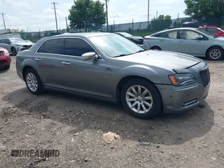 2012 Chrysler 300 Limited with VIN 2C3CCACG1CH249446, listed as a IAAI auction lot 42670307 with 143,000 mi miles and . Bid and sale history available at DreamBid. Image 1.