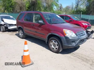 2006 Honda CR-V LX with VIN JHLRD68556C001167, listed as a IAAI auction lot 42104036 with 113,590 mi miles and . Bid and sale history available at carsss.com. Image 1.