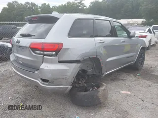 2018 Jeep Grand Cherokee Laredo E z VIN 1C4RJEAG5JC404022, wystawiony jako IAAI lot #42586412 z przebiegiem 95 798 mil mil oraz . Historia ofert i sprzedaży dostępna na DreamBid. Obrazek 4.
