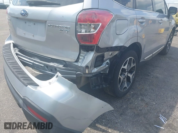 2015 Subaru Forester XT Touring z VIN JF2SJGUC4FH449213, wystawiony jako IAAI lot #42128074 z przebiegiem 112 373 mil mil oraz . Historia ofert i sprzedaży dostępna na DreamBid. Obrazek 6.