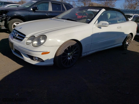 2009 Mercedes-Benz CLK-Class 5.5L with VIN WDBTK72F69T102852, listed as a Copart auction lot 80244754 with 113,421 mi miles and Salvage Title. Bid and sale history available at carsss.com. Image 1.