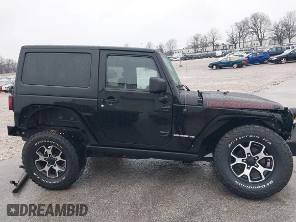 2012 Jeep Wrangler Rubicon with VIN 1C4BJWCG4CL106746, listed as a IAAI auction lot 41162452 with 134,911 mi miles and . Bid and sale history available at DreamBid. Image 14.