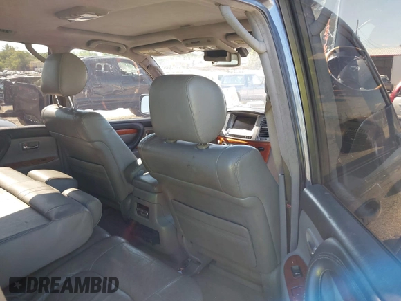 2003 Lexus LX with VIN JTJHT00W233532297, listed as a IAAI auction lot 42189676 with 235,992 mi miles. Bid and sale history available at carsss.com. Image 8.