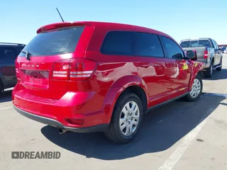 2015 Dodge Journey SE z VIN 3C4PDCAB9FT587668, wystawiony jako IAAI lot #41868556 z przebiegiem 99 695 mil mil oraz . Historia ofert i sprzedaży dostępna na DreamBid. Obrazek 4.