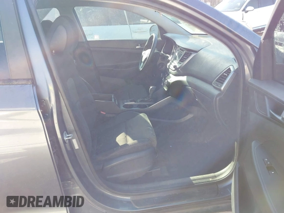 2017 Hyundai Tucson SE with VIN KM8J33A48HU413430, listed as a IAAI auction lot 41993667 with 150,736 mi miles and . Bid and sale history available at DreamBid. Image 5.