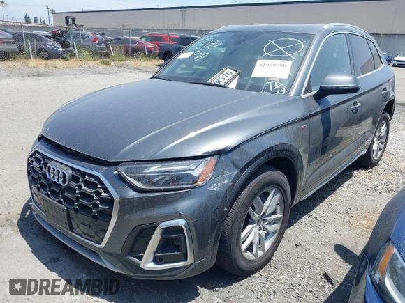 2022 Audi Q5 S line Premium z VIN WA1GAAFY3N2088773, wystawiony jako IAAI lot #41969990 z przebiegiem 22 922 mil mil oraz . Historia ofert i sprzedaży dostępna na DreamBid. Obrazek 18.