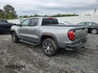 2023 GMC Canyon 4WD AT4 with VIN 1GTP6DEK4P1124937, listed as a Copart auction lot 66103474 with 10,566 mi miles and Salvage Title. Bid and sale history available at carsss.com. Image 2.